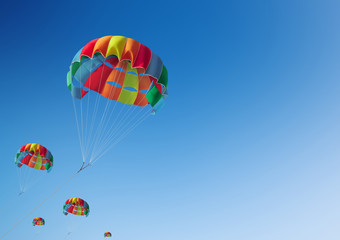 The colorful parachute stripes on the sky,Summer Camp in Beach