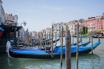 Obraz na płótnie Canvas gondolas in venice near the pier