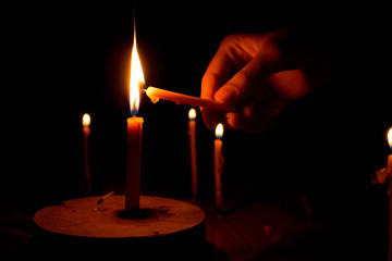 Light a candle on a power outage night