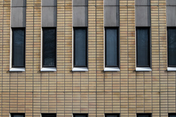 Facade of office building with narrow windows