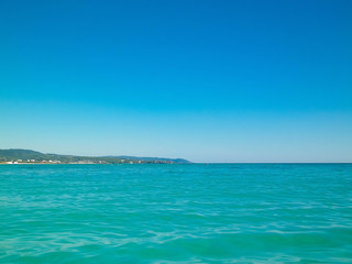 Fototapeta premium Blue water of Tyrrhenian sea in Vada, Tuscany, Italy.