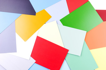 Many sheets of colored paper. Background of colored paper