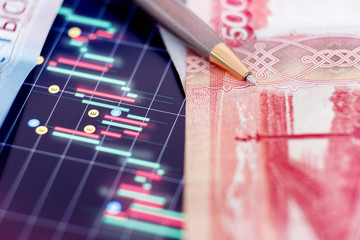 Ruble exchange rate chart on international stock exchanges. Concept depreciation of currencies and shares of Russian oil enterprises, default