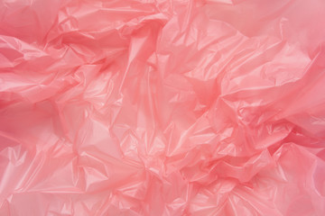 Close up Texture of a Pink Plastic garbage Bag. Polyethylene Fil