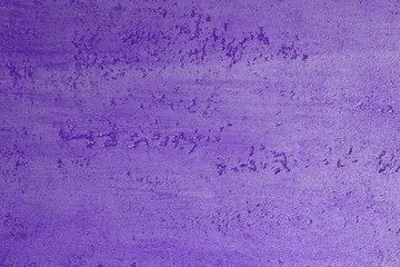 creative aged purple decorative plaster texture for design purposes.