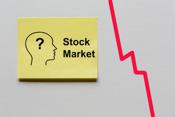 yellow note sticker with silhouette of a head with question mark and the text: Stock Market. On the...
