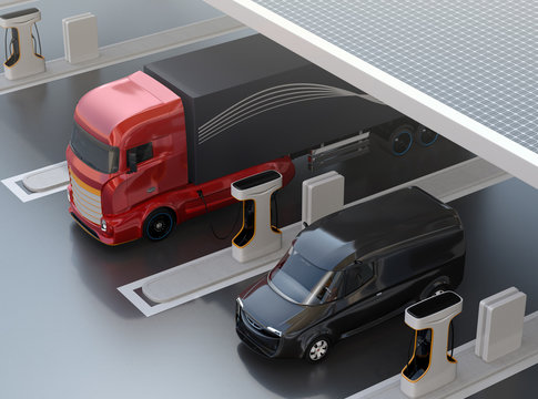 Generic design Heavy Electric Truck charging at Public Charging Station with roof-mounted solar panels. 3D rendering image.