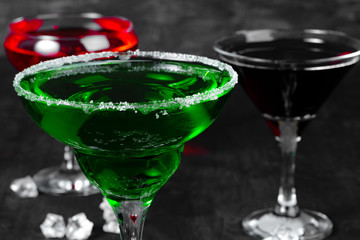 Beautiful alciohol cocktail on dark stone table