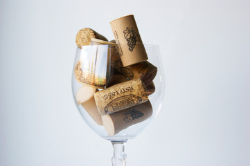 Many bottle caps from different wine producers.