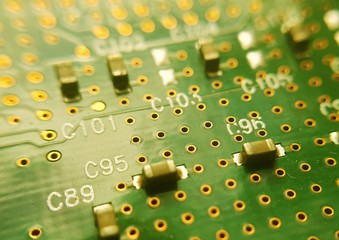 Electronic circuit board close up. Green PCB