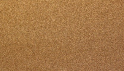 Fototapeta na wymiar brown cardboard background with fine-grained texture