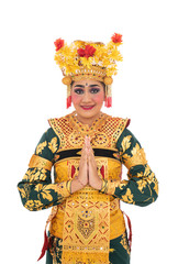 Balinese dancer woman standing with gestures welcoming to guest