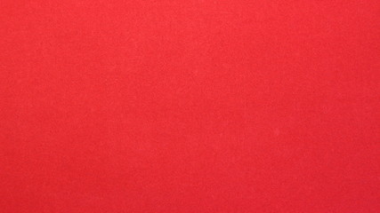red bright paper background with a smooth texture