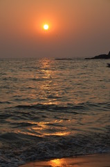 Beautiful sunset on the Arabian Sea. Vacation concept in India. North Goa. February 2020
