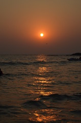 Beautiful sunset on the Arabian Sea. Vacation concept in India. North Goa. February 2020