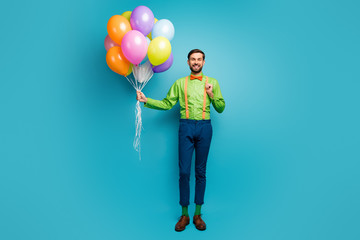 Full length body size view of his he nice attractive imposing funky glad cheerful cheery guy delivering air balls isolated on bright vivid shine vibrant blue green teal turquoise color background