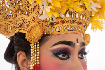 Asian woman portrait with Balinese dancer crown, wearing tradional Balinese dancer clothes