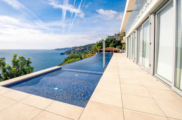 Fototapeta na wymiar Luxury swimming pool with beautiful sea view.