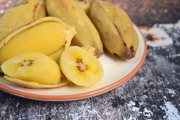 Naklejka na ściany i meble Pisang rebus or boiled banana. Pisang Kepok or Saba banana