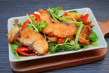 Stir fried sea bass with celery