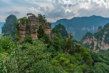 Fototapeta na wymiar Mountain landscape of surreal rock formations. Pillar, weird column rock formation in in Zhangjiajie National Park, China