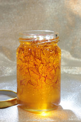 organic saffron honey in a jar
