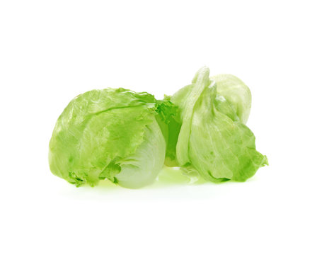 Fresh green lettuce leafs isolated on white background