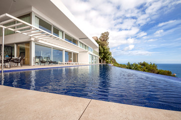 Luxury beach house with sea view. luxury infinity pool and terrace  in modern design, Vacation home...