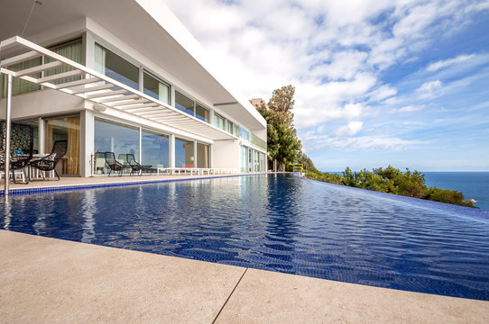 Luxury Beach House With Sea View. Luxury Infinity Pool And Terrace  In Modern Design, Vacation Home For Big Family.