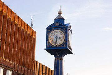 a old clock in the city center england uk