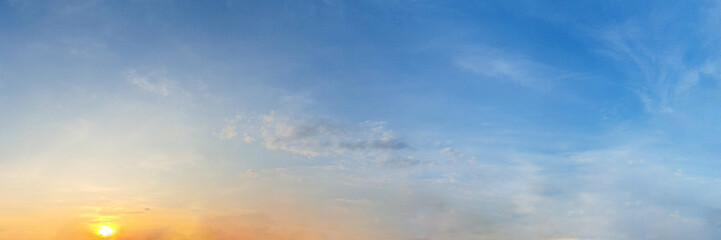Panorama of Dramatic vibrant color with beautiful cloud of sunrise and sunset. Panoramic image.