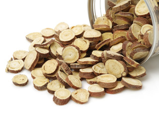 Licorice roots on white background