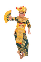 Dancers perform Balinese dances wearing traditional clothes with Hindu cultural accessory symbols