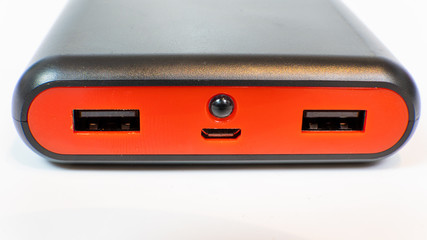 External battery with two USB inputs and light bulb