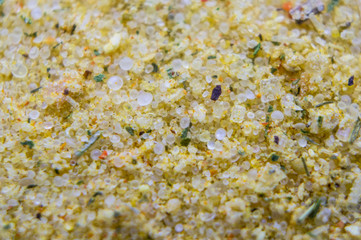 Seasoning for chicken with salt close-up. Macro photography