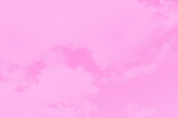 Fototapeta na wymiar Pastel sky background. Pink sky with fluffy clouds