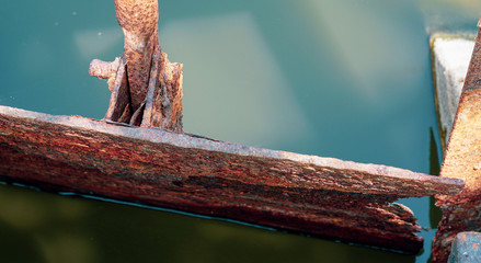 The steel is corroded and rusted in water.