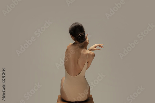 Graceful Classic Ballerina Dancing Posing Isolated On Pastel Brown Studio Background Females Back And Hands The Grace Artist Movement Action And Motion Concept Looks Weightless Flexible Wall Mural Master1305