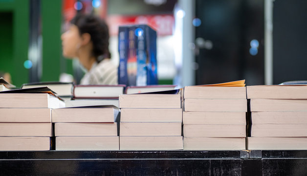 Book stack displayed in the book fair for business and education background