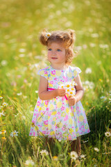 little girl having fun outdoors.