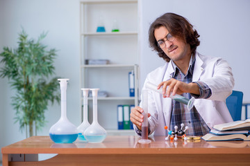 Chemistry lecturer during lecture in college