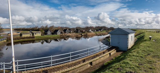 Obraz premium Small cottages behind the lockers in Sneum, Esbjerg Denmark