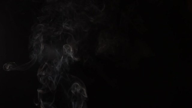  Slow motion video of tubers of smoke. Beautiful movement of smoke, steam from food and drinks.