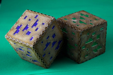 Naklejka premium Minecraft cubes made of plastic. Two brown minecraft cubes with glowing Windows