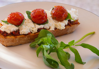 Sandwich with mozzarella cherry basil
