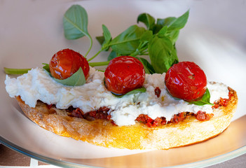 Sandwich with mozzarella cherry basil