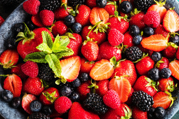 Berries closeup colorful assorted mix of strawberry, blueberry, raspberry, blackberry