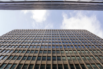 Bottom view of modern office buildings. Abstract background, copy space.