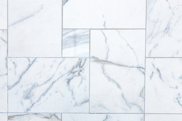 White marble tile wall for texture background.	