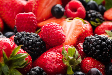 Berries closeup colorful assorted mix of strawberry, blueberry, raspberry, blackberry